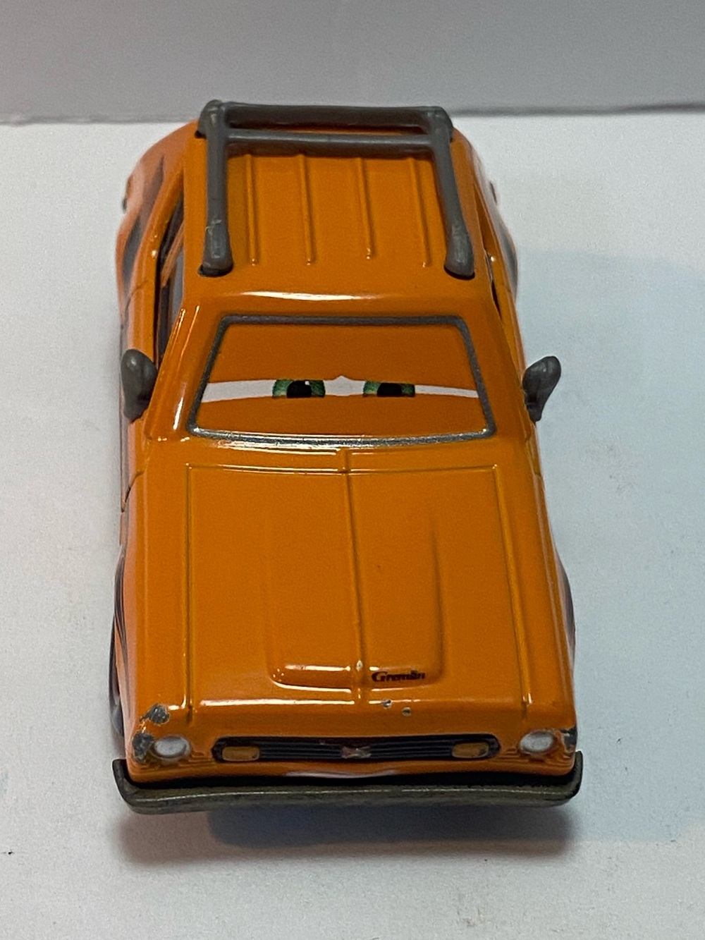 Disney Pixar Cars 2 Grem Collectible Diecast  Orange AMC Gremlin 1:55
